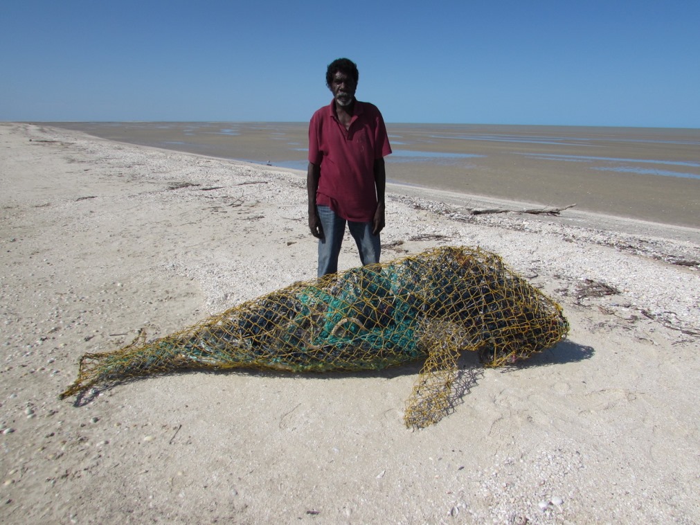 Michael Norman with his Dugong sculpture which was displayed in Monaco. Image courtesy: Pormpuraaw Art & Culture Centre
